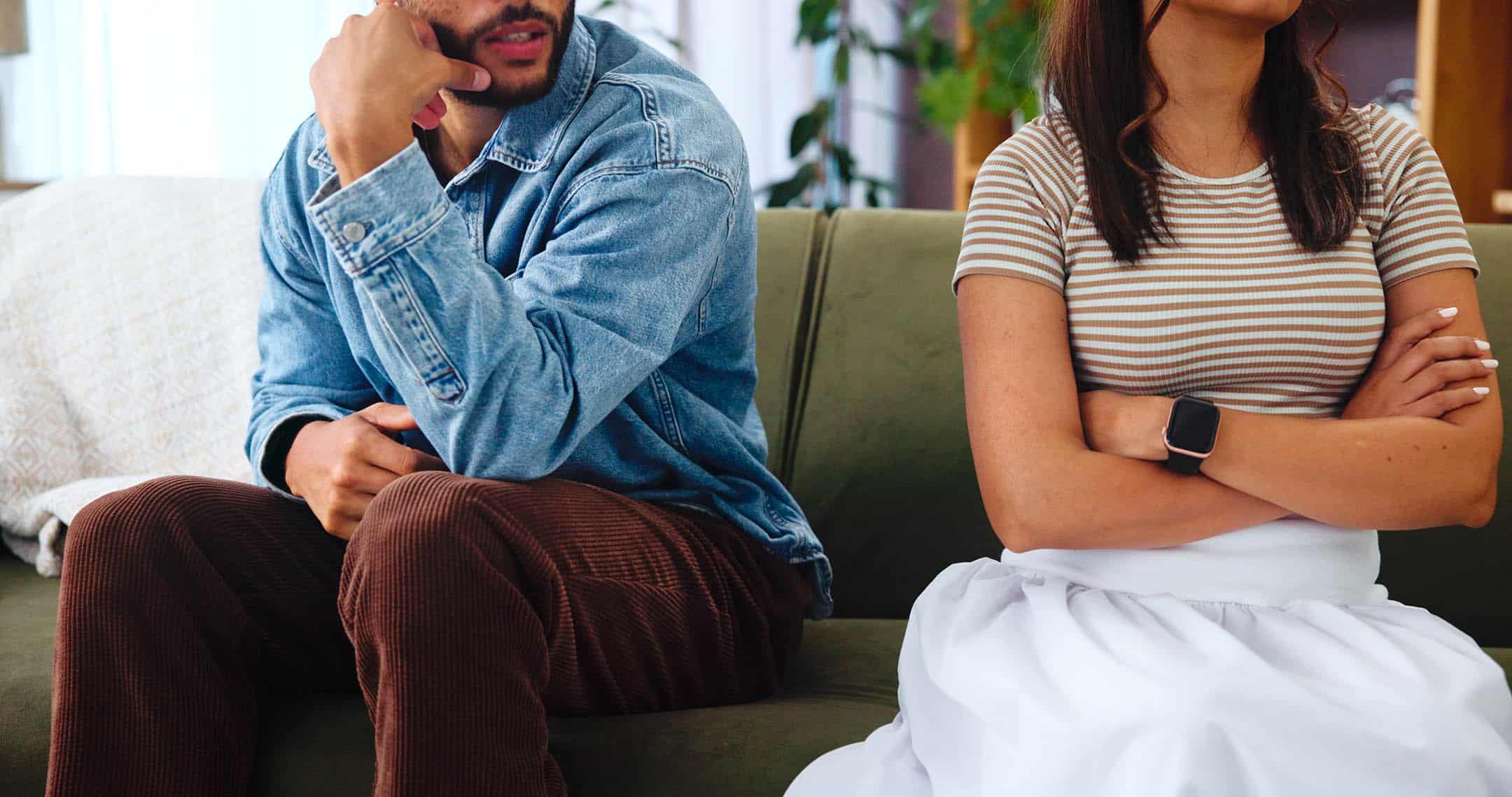 Fight, arms crossed and couple with argument, home and miscommunication for people in relationship. Conflict, man and woman with tension in house, toxic and mad for controlling behaviour in marriage.